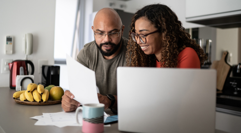 Two people reviewing bill